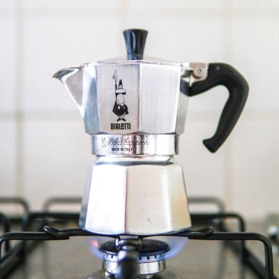 a moka pot on the stove top